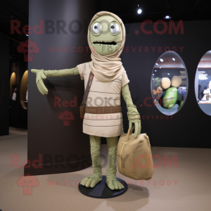 Olive Mummy mascot costume character dressed with a Skinny Jeans and Tote bags