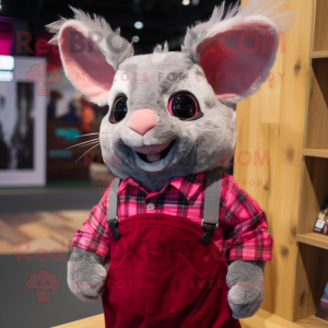 Magenta Chinchilla mascot costume character dressed with a Flannel Shirt and Suspenders