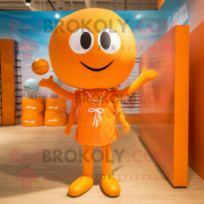 Orange Volleyball Ball mascot costume character dressed with a One-Piece Swimsuit and Bow ties