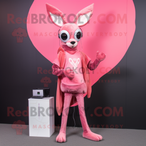 Pink Roe Deer mascot costume character dressed with a Skinny Jeans and Rings