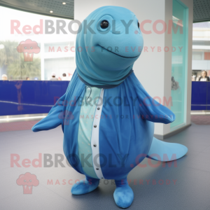 nan Blue Whale mascot costume character dressed with a Cardigan and Rings