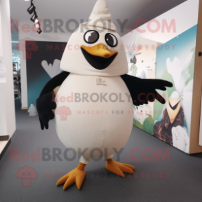 Cream Blackbird mascot costume character dressed with a Leggings and Foot pads