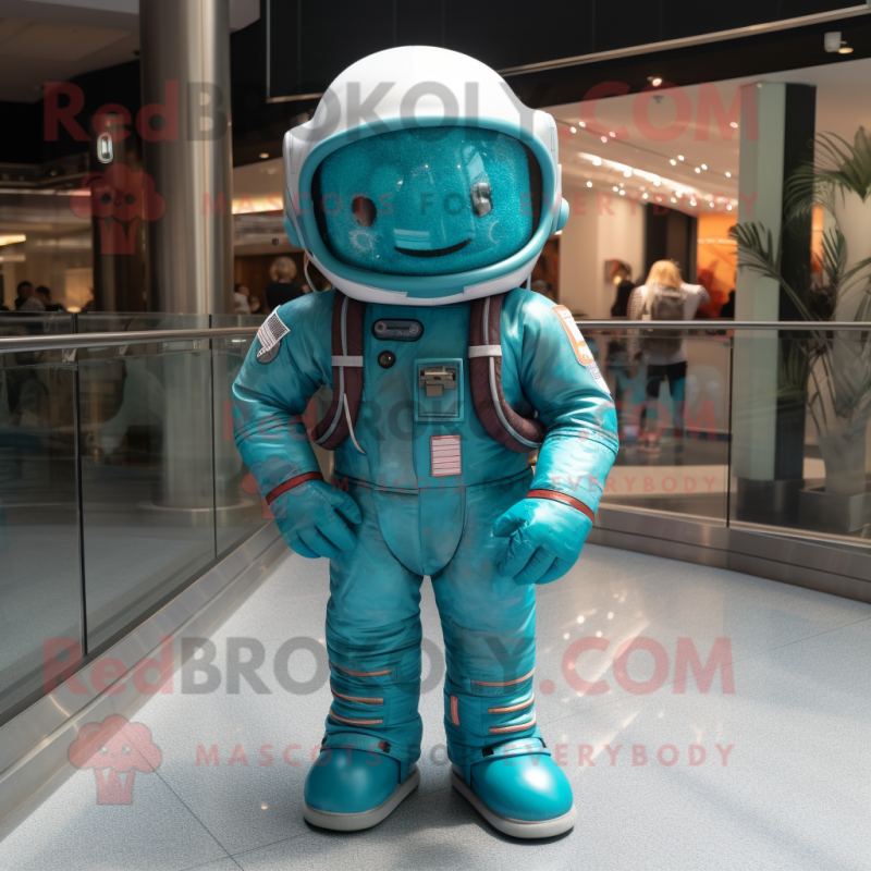 Teal Astronaut mascot costume character dressed with a Jeans and Headbands Teal Astronaut mascot costume character dressed with a Jeans and Headbands