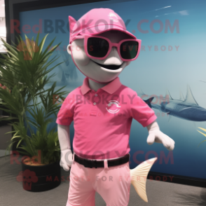 Pink Tuna mascot costume character dressed with a Polo Shirt and Sunglasses