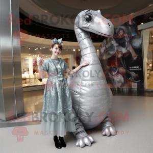 Silver Diplodocus mascot costume character dressed with a Mini Dress and Wraps