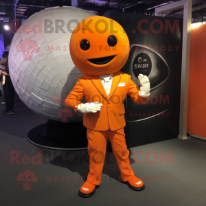 Orange Human Cannon Ball mascot costume character dressed with a Suit and Cufflinks