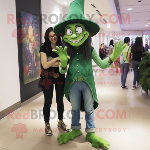 Green Witch'S Hat mascot costume character dressed with a Skinny Jeans and Watches