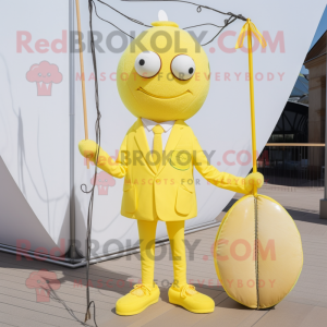 Lemon Yellow Tightrope Walker mascot costume character dressed with a Suit and Tote bags