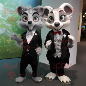 Silver Aye-Aye mascot costume character dressed with a Tuxedo and Smartwatches