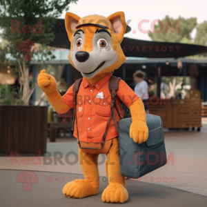 Orange Dingo mascot costume character dressed with a Denim Shorts and Messenger bags