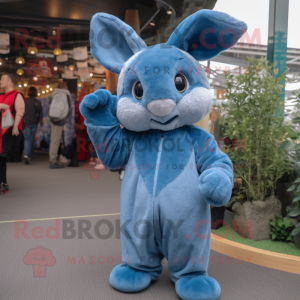 Blue Wild Rabbit mascot costume character dressed with a Jumpsuit and Mittens