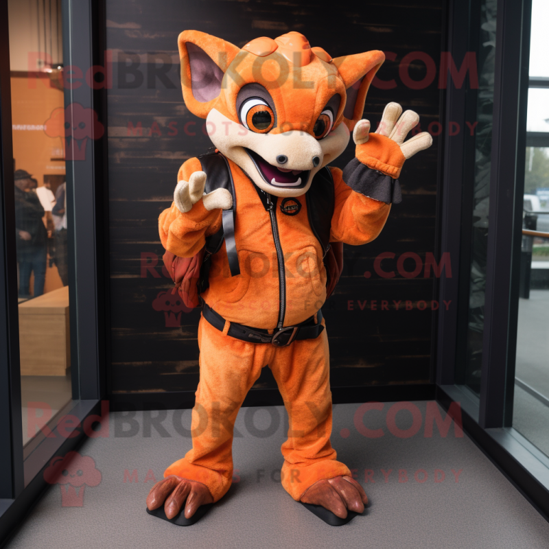 Orange Chupacabra mascot costume character dressed with a Leather Jacket and Beanies