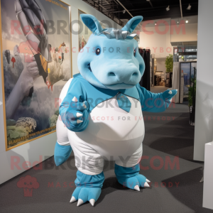 Sky Blue Rhinoceros mascot costume character dressed with a Capri Pants and Brooches