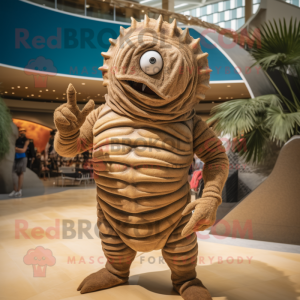 Tan Trilobite mascot costume character dressed with a Swimwear and Rings