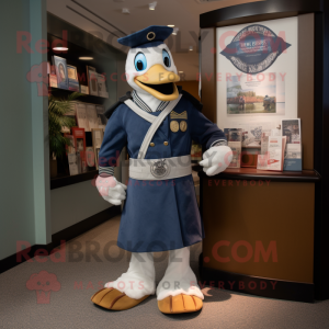 Navy Goose mascot costume character dressed with a Graphic Tee and Wallets