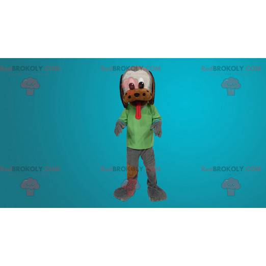 Mascota de perro tricolor con una gran lengua - Redbrokoly.com