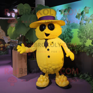 Yellow Grape mascot costume character dressed with a Suit and Hats