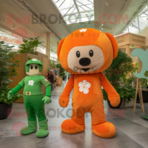 Orange Four Leaf Clover mascot costume character dressed with a Henley Shirt and Watches