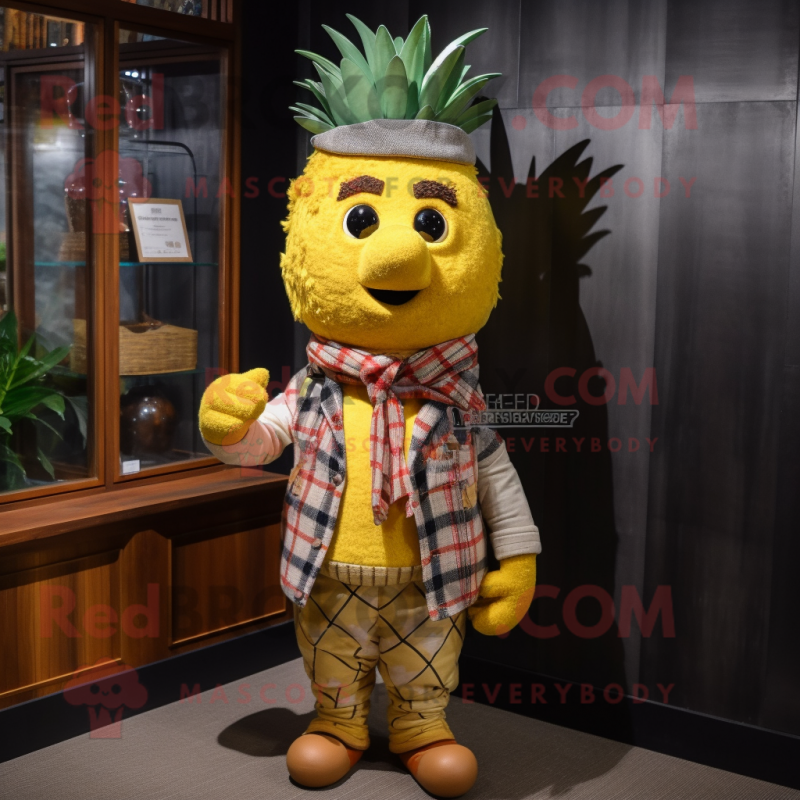 Yellow Pineapple mascot costume character dressed with a Flannel Shirt and Shawl pins Yellow Pineapple mascot costume character dressed with a Flannel Shirt and Shawl pins