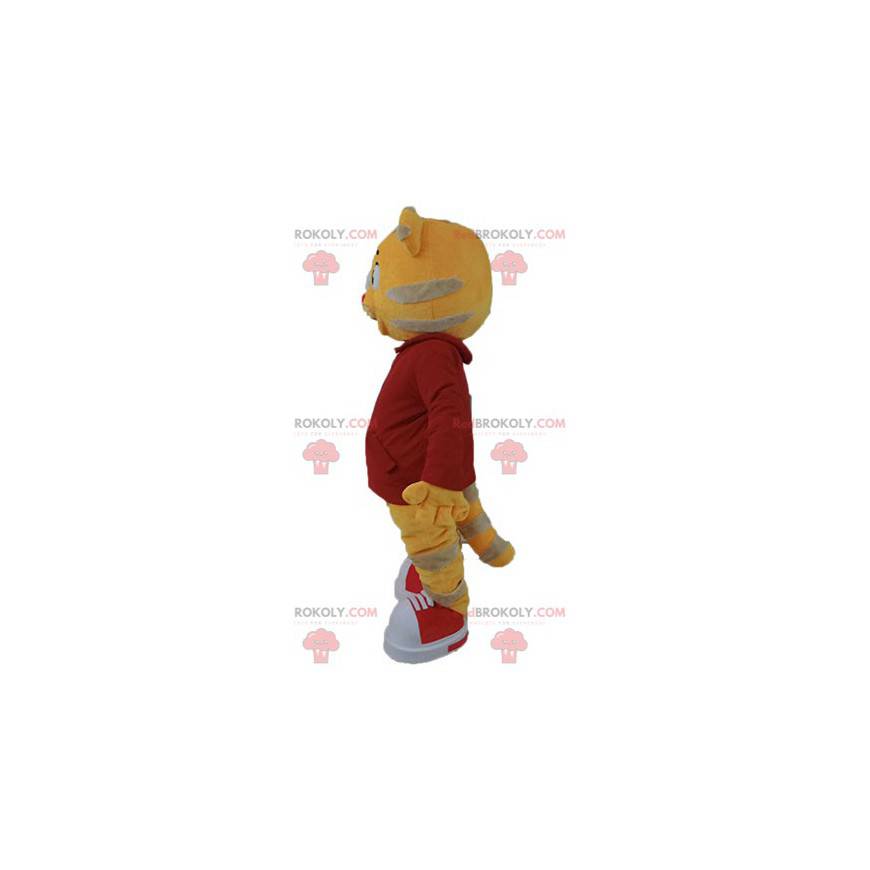 Mascota gato naranja y gris vestida de rojo - Redbrokoly.com Mascota gato naranja y gris vestida de rojo - Redbrokoly.com