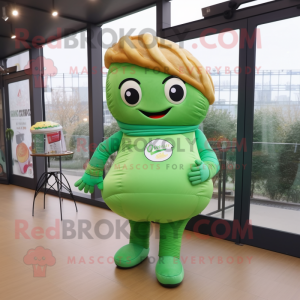 Green Croissant mascot costume character dressed with a Jeans and Anklets