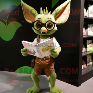 Olive Bat mascot costume character dressed with a Graphic Tee and Reading glasses