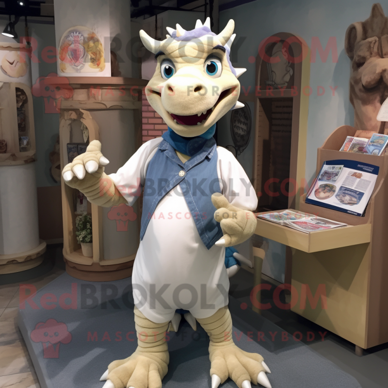 Cream Dragon mascot costume character dressed with a Chambray Shirt and Brooches