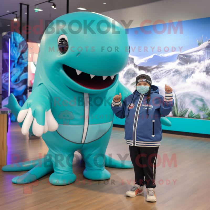 Turquoise Humpback Whale mascot costume character dressed with a Bomber Jacket and Watches