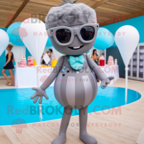 Gray Wedding Cake mascot costume character dressed with a One-Piece Swimsuit and Sunglasses