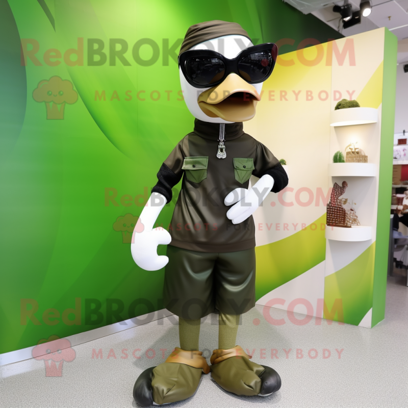 Olive Swan mascot costume character dressed with a Bodysuit and Sunglasses Olive Swan mascot costume character dressed with a Bodysuit and Sunglasses