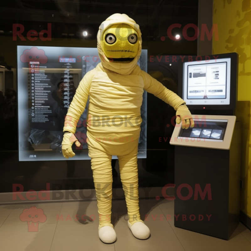 Lemon Yellow Mummy mascot costume character dressed with a Romper and Digital watches Lemon Yellow Mummy mascot costume character dressed with a Romper and Digital watches