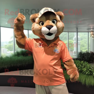 Peach Mountain Lion mascot costume character dressed with a Polo Shirt and Hairpins