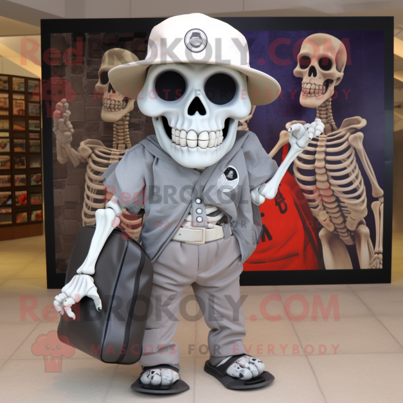 Gray Skull mascot costume character dressed with a Polo Shirt and Messenger bags