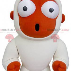 Orange and white monkey mascot looking surprised -