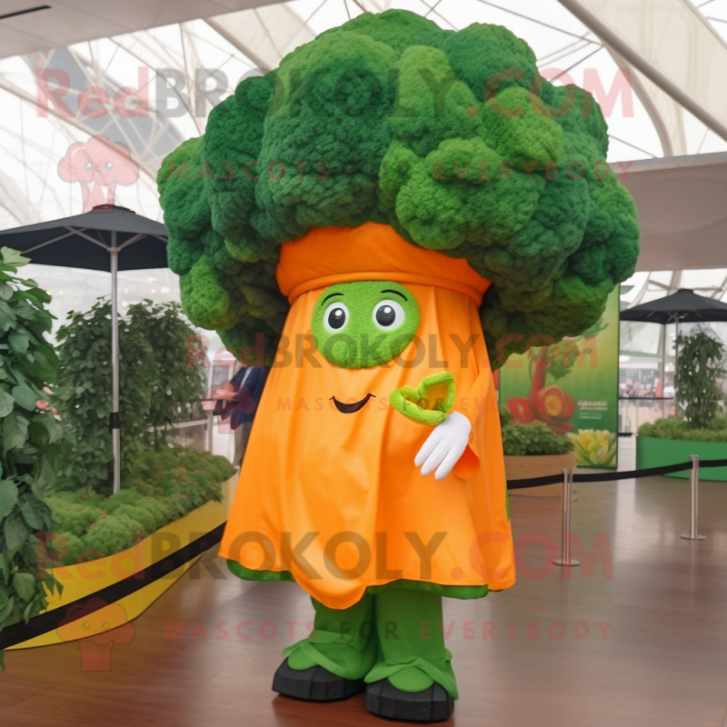 Orange Broccoli mascot costume character dressed with a Raincoat and Headbands Orange Broccoli mascot costume character dressed with a Raincoat and Headbands
