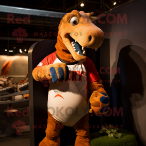 Rust Diplodocus mascot costume character dressed with a Rugby Shirt and Mittens