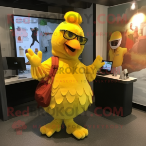 Yellow Chicken mascot costume character dressed with a Jumpsuit and Messenger bags