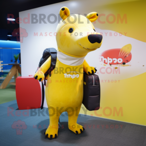 Yellow Tapir mascot costume character dressed with a Skinny Jeans and Tote bags