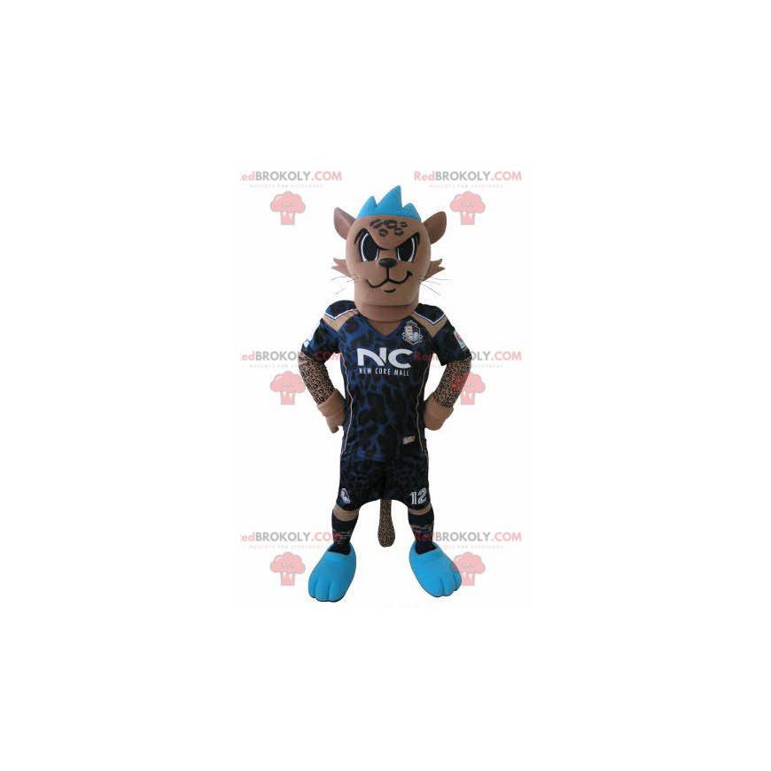 Mascote tigre com roupa de jogador de futebol e crista azul -