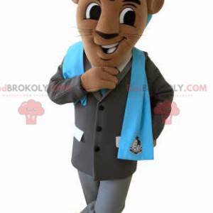 Mascota del tigre marrón con un traje y una cresta azul -