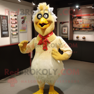 Beige Chicken mascot costume character dressed with a Rash Guard and Tie pins