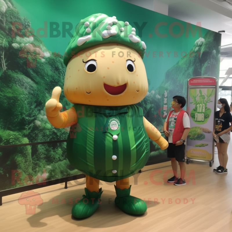 Forest Green Croissant mascot costume character dressed with a Swimwear and Berets