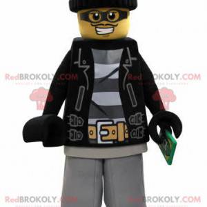 Lego-mascotte gekleed als een bandiet met een pet -