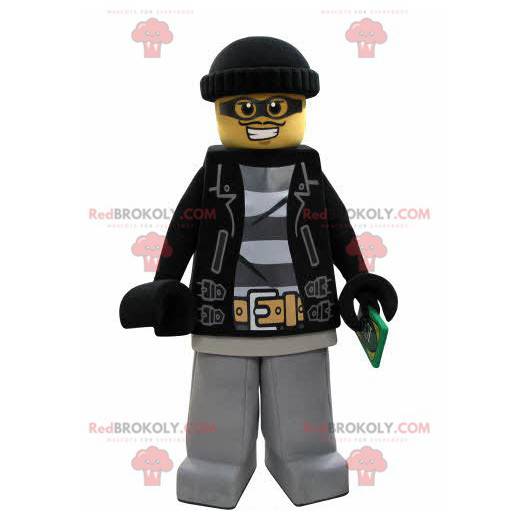 Lego-Maskottchen als Bandit mit Mütze verkleidet -