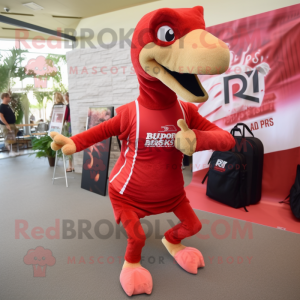 Red Deinonychus mascot costume character dressed with a Running Shorts and Tote bags