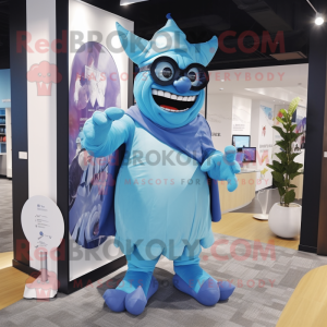 Sky Blue Ogre mascot costume character dressed with a Shift Dress and Eyeglasses