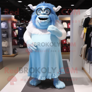 Sky Blue Ogre mascot costume character dressed with a Shift Dress and Eyeglasses