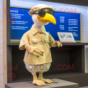 Beige Dodo Bird mascot costume character dressed with a Shorts and Reading glasses