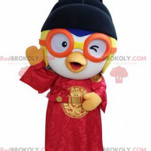 Mascotte d'oiseau en tenue asiatique avec des lunettes -