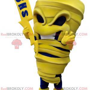 Mascot yellow and blue mummy with a lightning bolt -